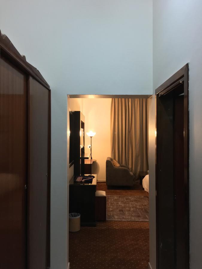 Dama Hotel Duba Habitación foto