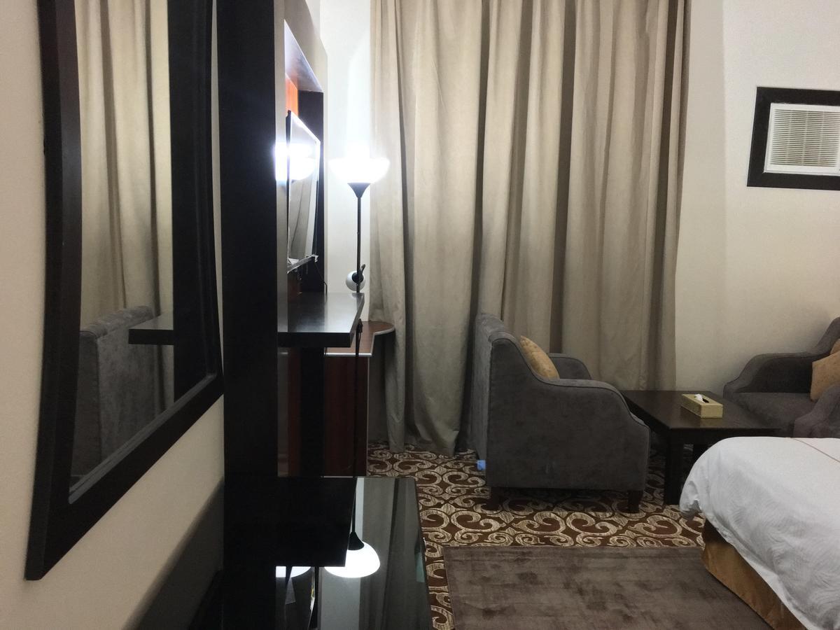 Dama Hotel Duba Habitación foto